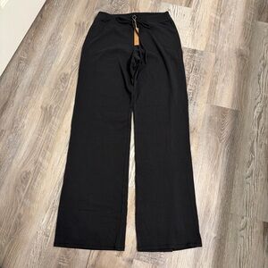 Skims black cotton jersey straight leg pants size medium 
New with tag